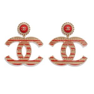 Chanel metal & calfskin gold and red CC earrings